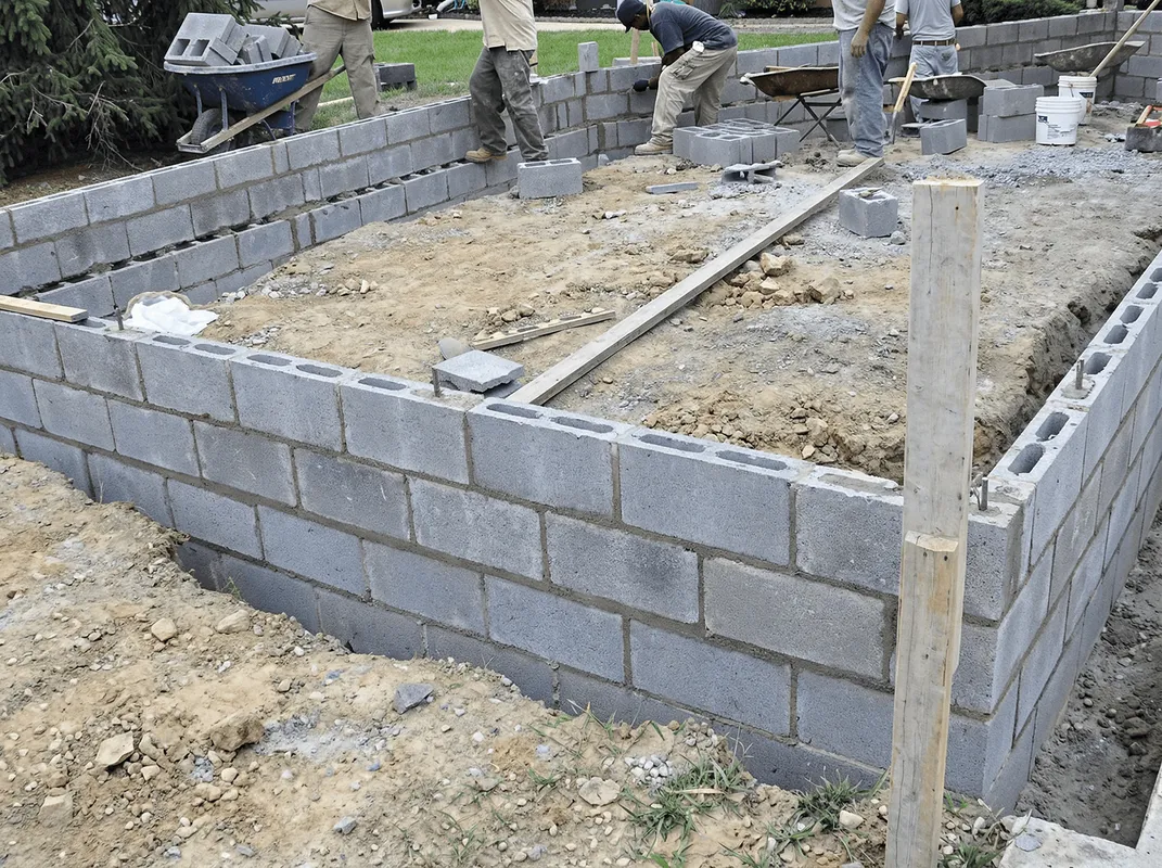 Professionals building a foundation with blocks in Ogden, UT