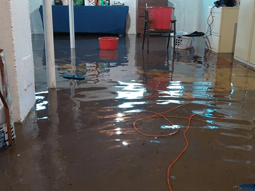 Basement with boiler, cabinets and washing machine completely flooded in Ogden, UT